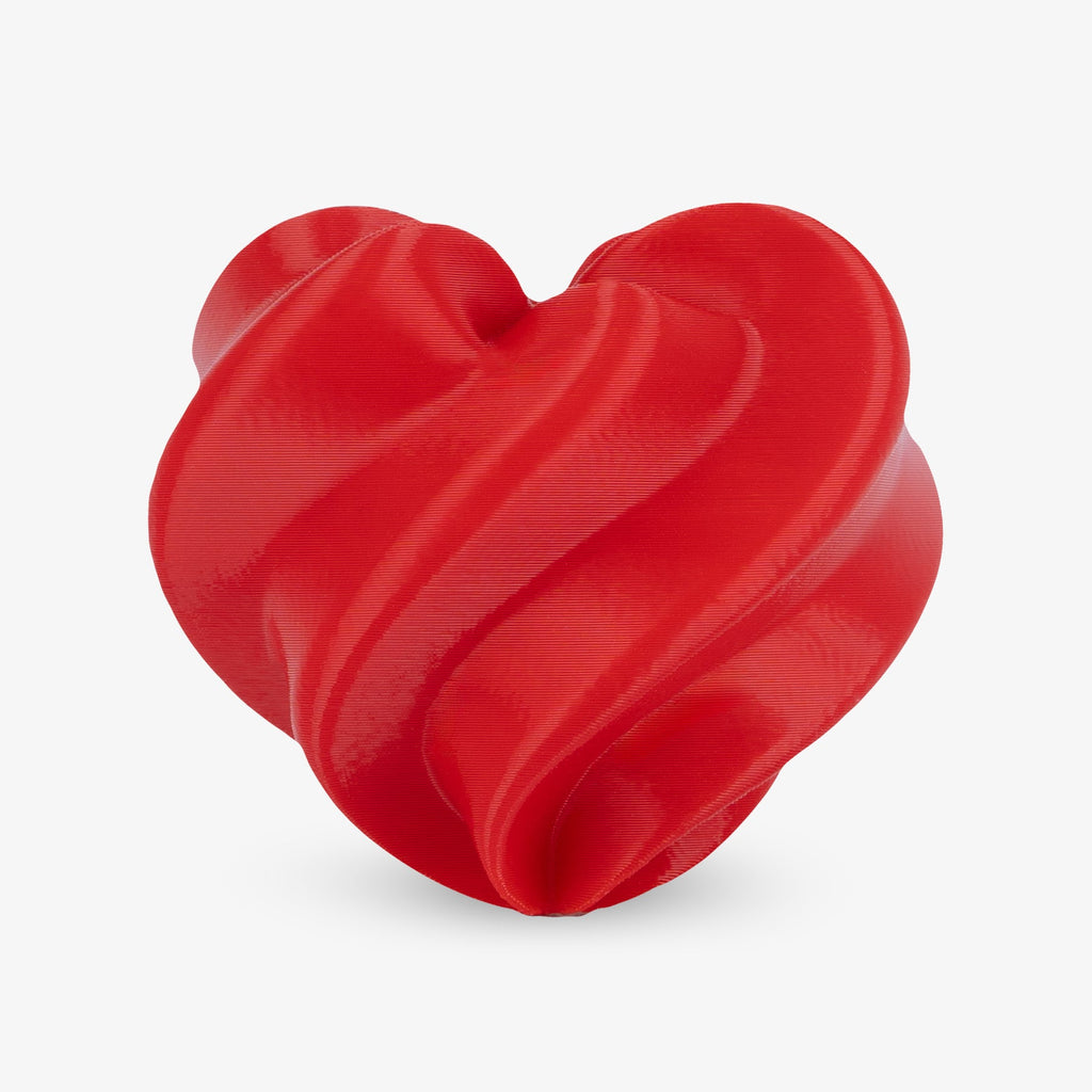 Red twisted heart model printed with PETG filament
